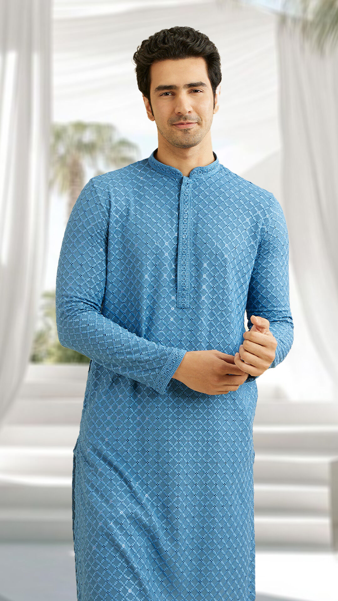 Man wearing beautiful light blue embroidered cotton kurta, go to for every occasion